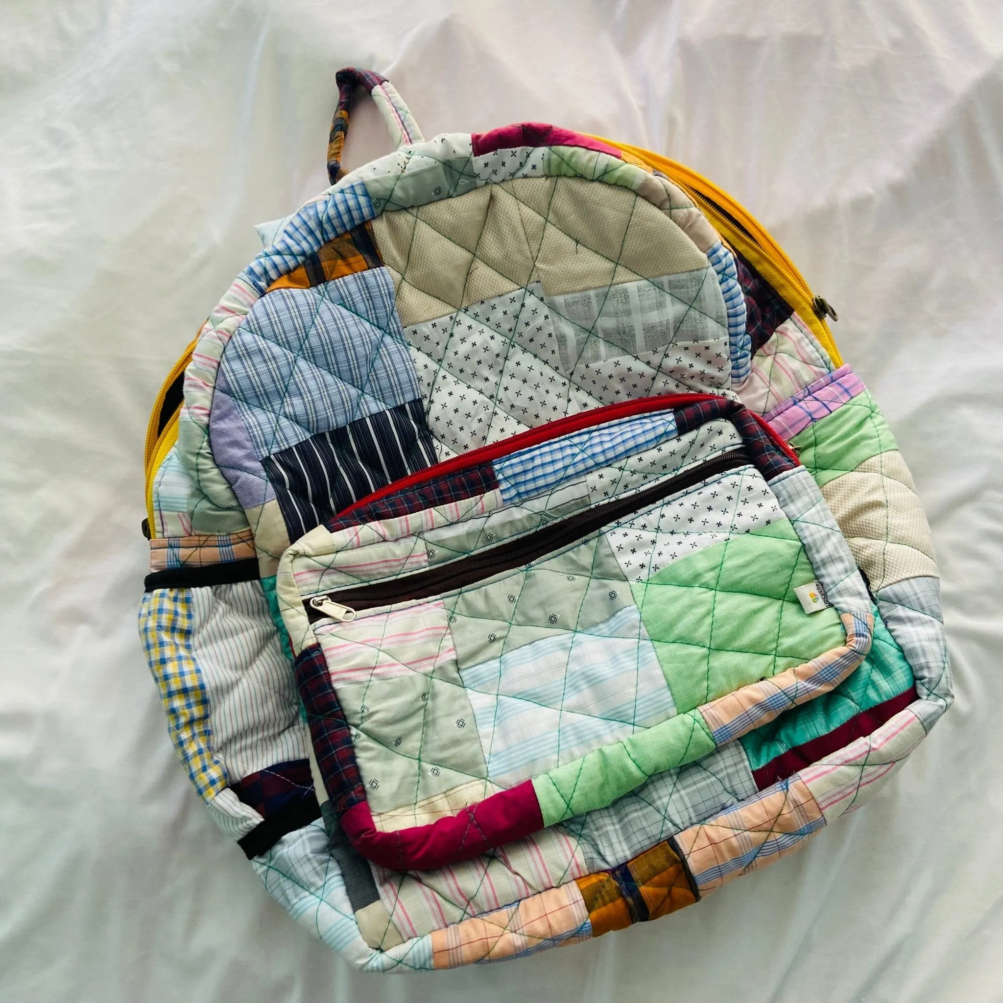 Eco-friendly and Stylish Backpacks: Plaids, Stripes and Solids- Your Travel Companion