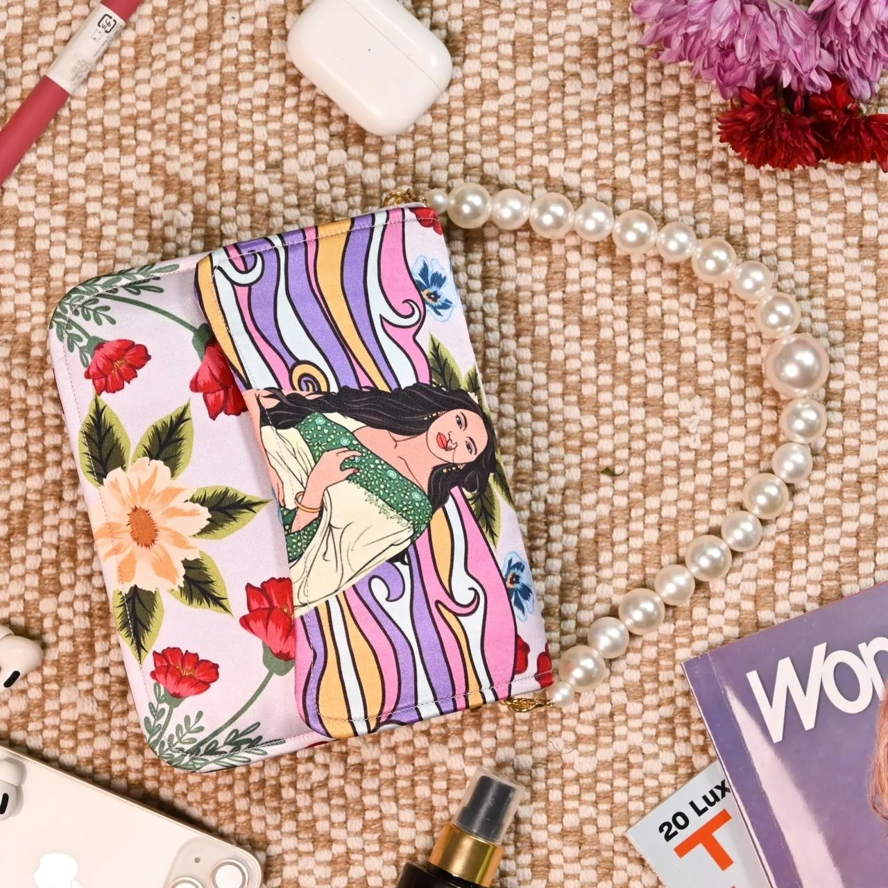 HIGH IN DEMAND printed flap clutches