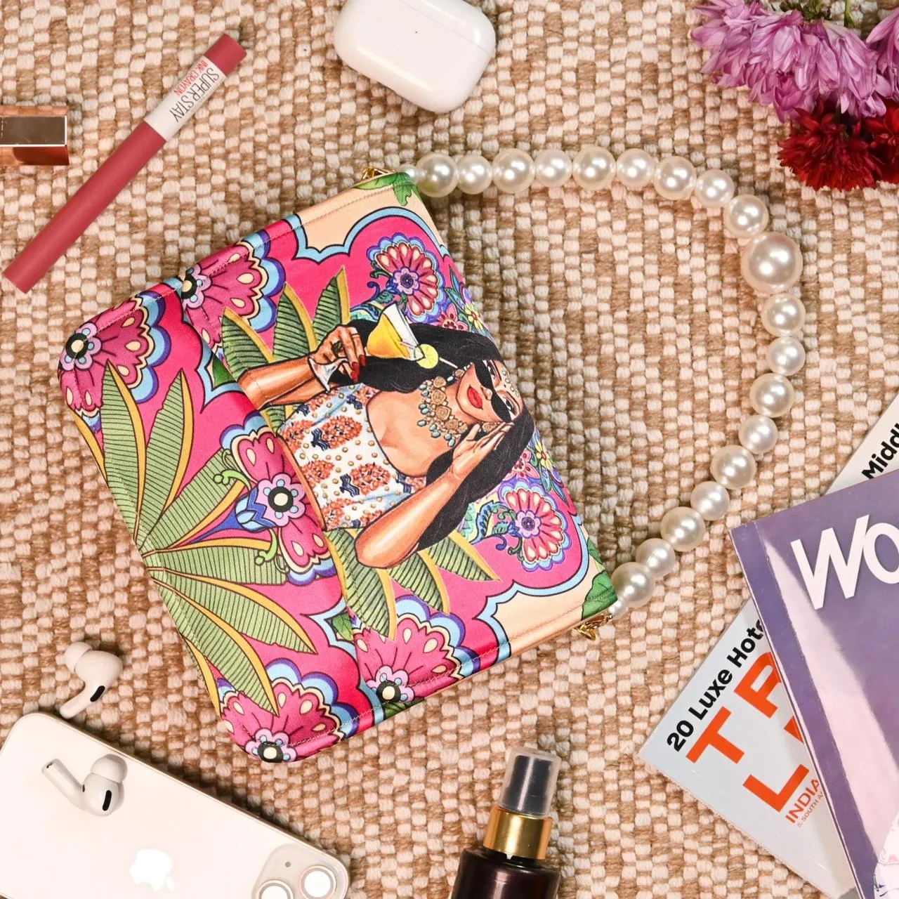 HIGH IN DEMAND printed flap clutches